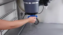 garbage disposal leaking from bottom